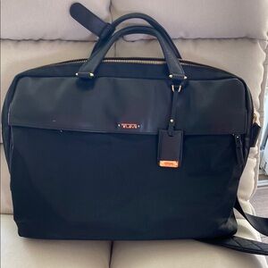 Tumi Black Briefcase with Structured Design and Detachable Strap